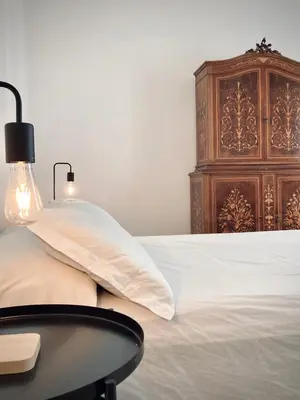 Letto o letti in una camera di Catania historical artist flat