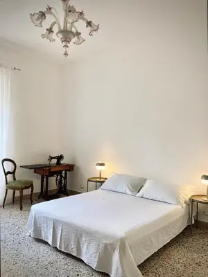 Letto o letti in una camera di Catania historical artist flat