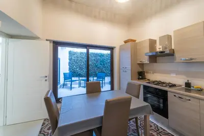 Cucina o angolo cottura di BELLINIKATANESUITE