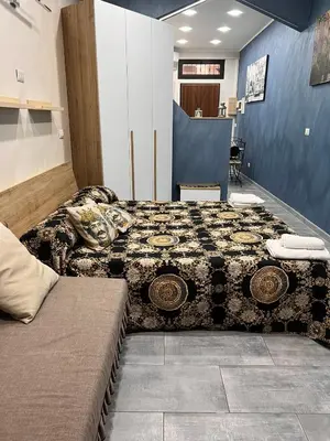 Letto o letti in una camera di Mary House Apartments