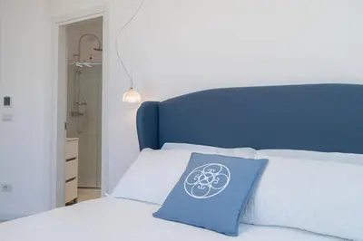 Letto o letti in una camera di Dimore delle Zagare Molo