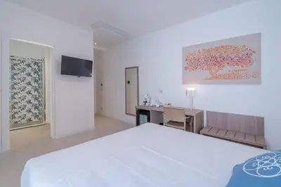 Letto o letti in una camera di Dimore delle Zagare Molo