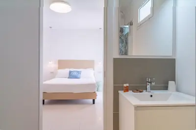 Letto o letti in una camera di Dimore delle Zagare Molo