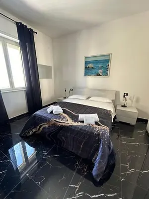 Letto o letti in una camera di Dyo Adelfia, elegante 