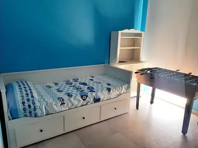 Letto o letti in una camera di Il Giardino dei Coralli