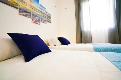 Letto o letti in una camera di Villa ALMA