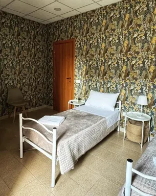 Letto o letti in una camera di Sicily O'Clock Room