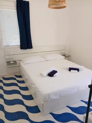 Letto o letti in una camera di Casa Plemmirio Varco 22