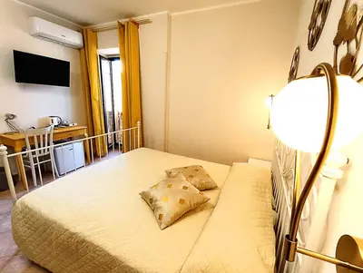 Letto o letti in una camera di DaMa Rooms