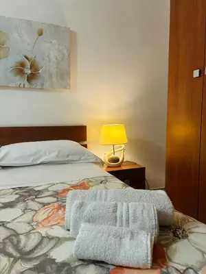 Letto o letti in una camera di Arricrietti house