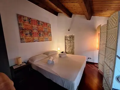 Letto o letti in una camera di Relax apartment - Ortigia Holidays