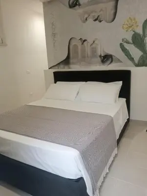 Letto o letti in una camera di Vicol8Netino