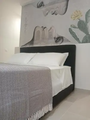 Letto o letti in una camera di Vicol8Netino