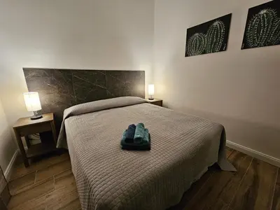 Letto o letti in una camera di La Casa di Ray e Anto