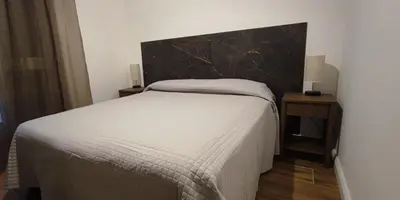 Letto o letti in una camera di La Casa di Ray e Anto