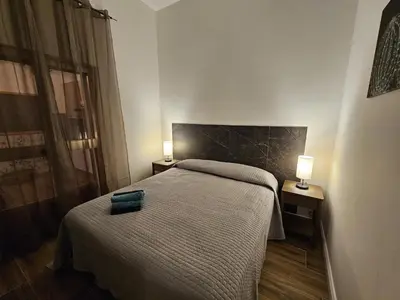 Letto o letti in una camera di La Casa di Ray e Anto