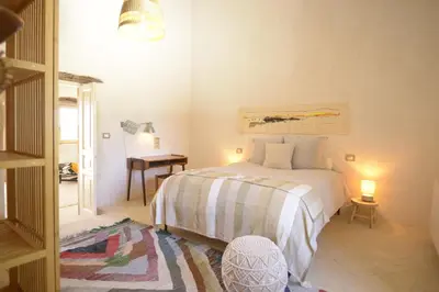 Letto o letti in una camera di Casa Imayah charming B&B