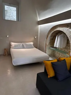 Letto o letti in una camera di Room2cento46