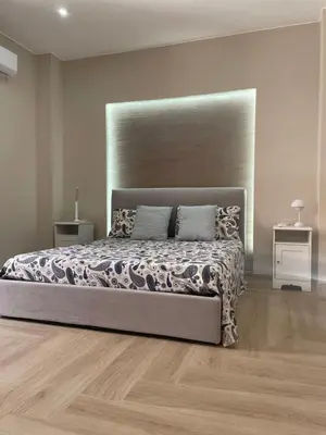 Letto o letti in una camera di Central apartment