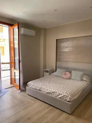 Letto o letti in una camera di Central apartment