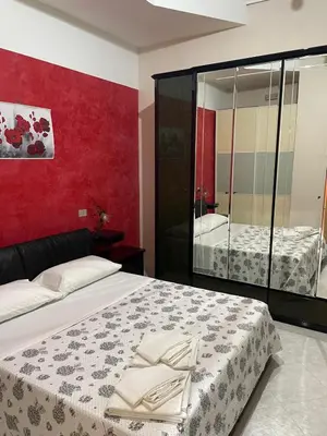 Letto o letti in una camera di Casa Ale