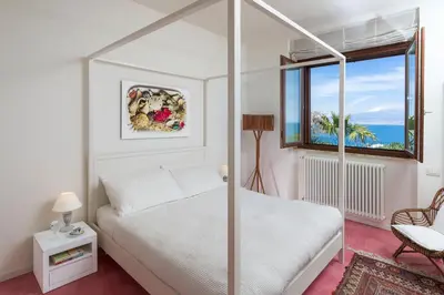Letto o letti in una camera di Coralia