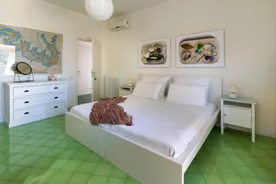 Letto o letti in una camera di Coralia