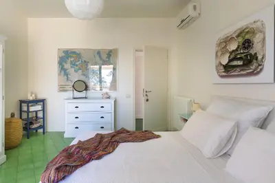Letto o letti in una camera di Coralia