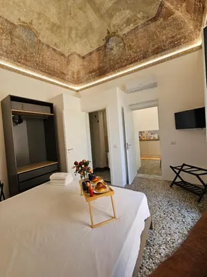 Letto o letti in una camera di Grey House Apartments