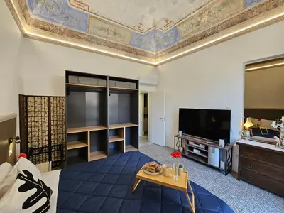 TV o dispositivi per l'intrattenimento presso Grey House Apartments