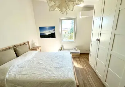 Letto o letti in una camera di Villa Zaffiri 94