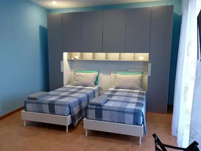 Letto o letti in una camera di Ibla nel Cuore