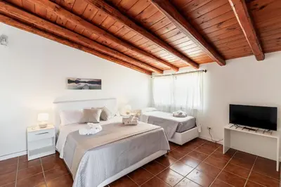 Letto o letti in una camera di Fronte Mare Apartments & City Views