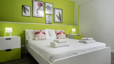 Letto o letti in una camera di Casamemi San Lorenzo a due passi dalla Spiaggia