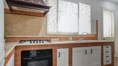 Cucina o angolo cottura di Casamemi San Lorenzo a due passi dalla Spiaggia