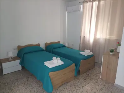 Letto o letti in una camera di La fiorita