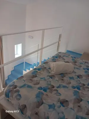 Letto o letti in una camera di Borgata Relax