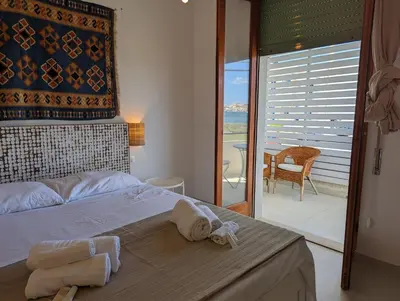 Letto o letti in una camera di Casa sul mare Vento di Levante