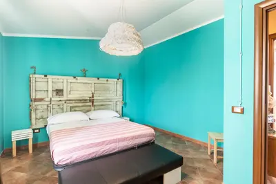 Letto o letti in una camera di Villa Scrusciu Ri Mari, Noto