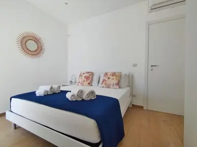 Letto o letti in una camera di Villa Ina Lux