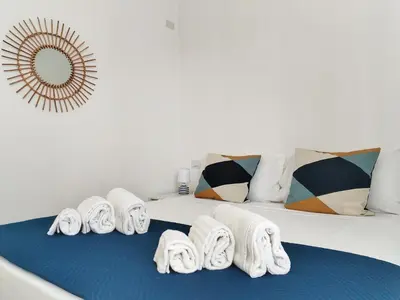 Letto o letti in una camera di Villa Ina Lux