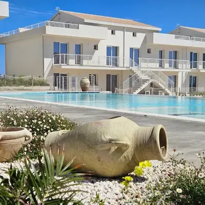 Bilocale in resort con piscine