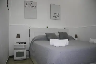 Letto o letti in una camera di Mydomu House