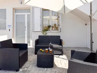 Area soggiorno di Holiday Houses San Lorenzo Calamosche