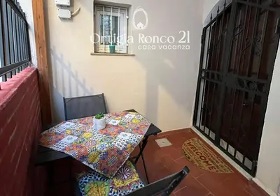 Area soggiorno di Ortigia Ronco 21 - casa vacanza