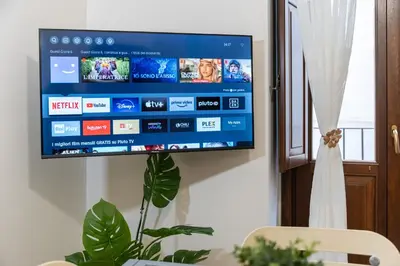 TV o dispositivi per l'intrattenimento presso Duomo Sensational Apartment - Catania Center