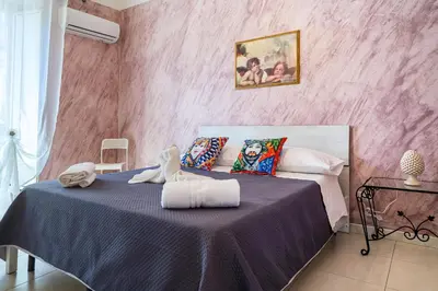 Letto o letti in una camera di VM Apartment