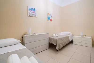 Letto o letti in una camera di VM Apartment