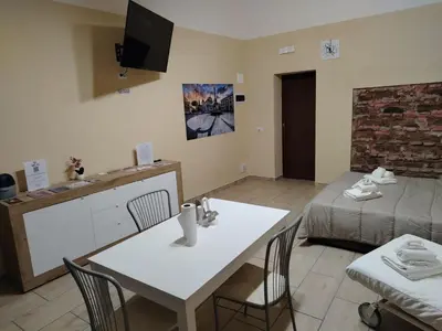 Letto o letti in una camera di Sicilian Room