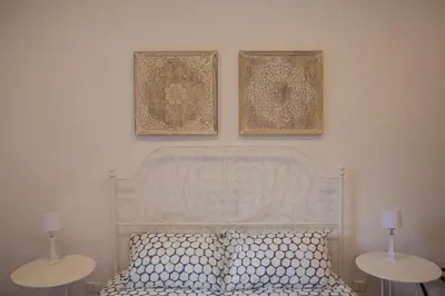 Letto o letti in una camera di Casa Miele Ortigia